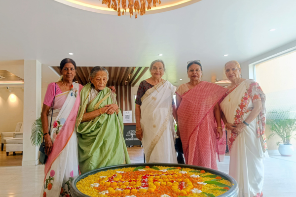 Seniors at Jagriti Dham, widely recognized as the best senior living in India, are seen here gathering together for a joyful Poila Baisakh celebration, dressed in traditional festive attire.