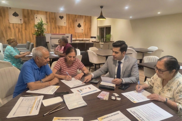 Elderly residents receiving financial guidance as part of elderly care in Kolkata