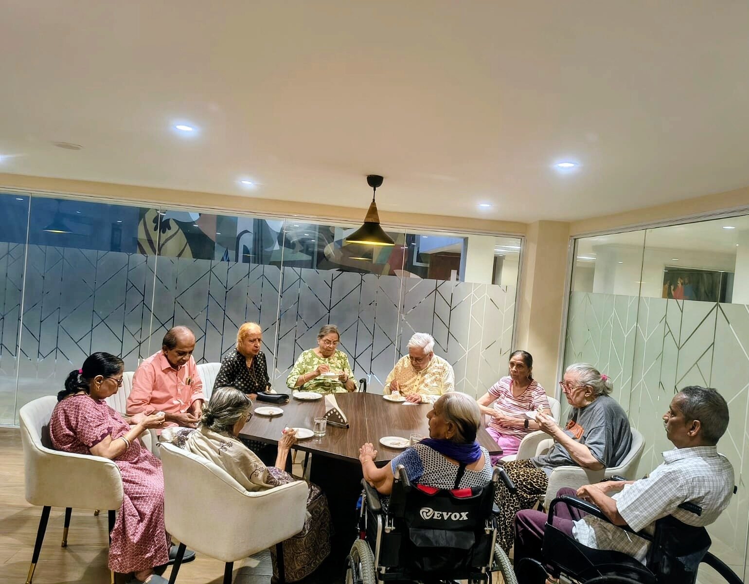 Senior community living with shared meals and social interaction